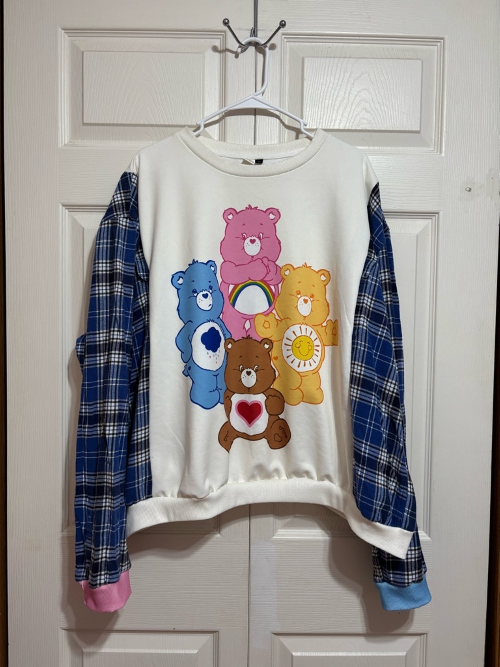 Crewneck Care Bears Graphic Sweatshirt with Plaid Sleeves - Cream & Blue